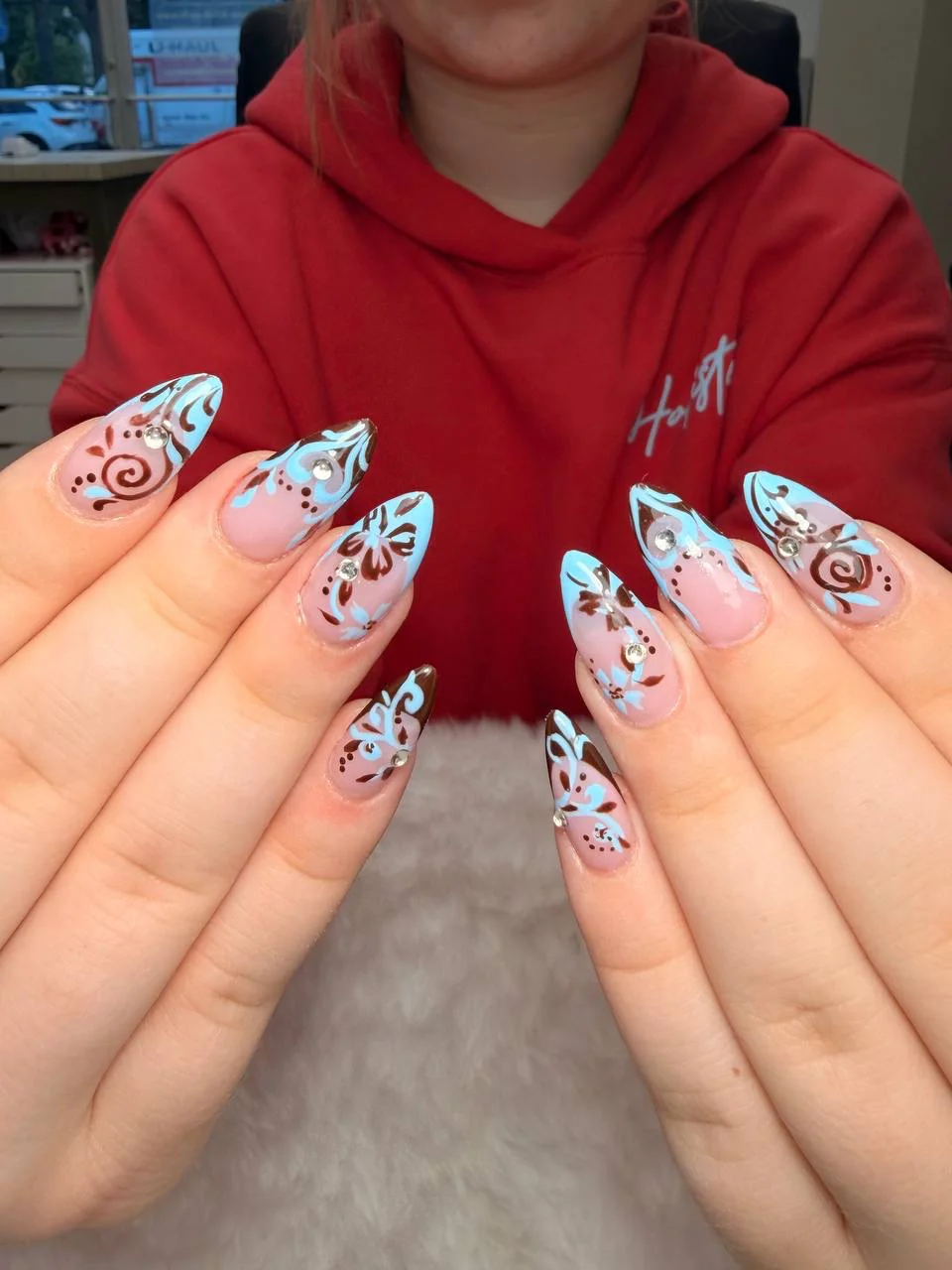 Detailed black and blue nail art